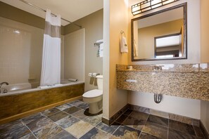 Standard Room, 1 King Bed, Non Smoking, Jetted Tub (Oversized Room) | Bathroom | Combined shower/bathtub, free toiletries, hair dryer, towels - Best Western Northwest Lodge (Boise)