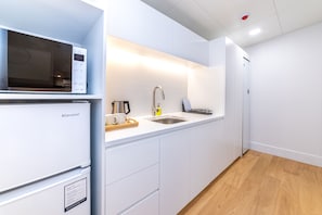 Premium Family Suite With Loft 1601 | Private kitchen | Fridge, coffee/tea maker, electric kettle
