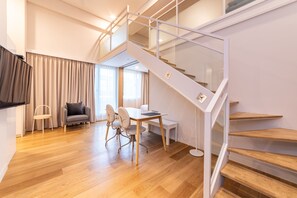 Premium Family Suite With Loft 1604 | In-room safe, individually furnished, desk, blackout drapes