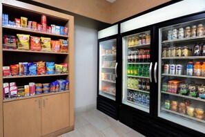 A snack and beverage section with various products. - Holiday Inn Express & Suites Raleigh Durham Airport at RTP by IHG (Durham)