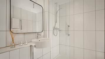 Shower, eco-friendly toiletries, hair dryer, towels