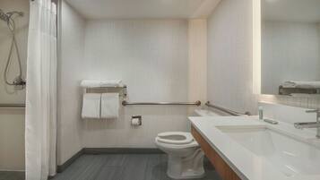 Room, 1 King Bed | Bathroom | Combined shower/tub, free toiletries, hair dryer, towels