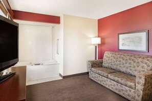 Suite, 1 Queen Bed, Non Smoking, Jetted Tub (with Sofabed) | Desk, laptop workspace, soundproofing, iron/ironing board