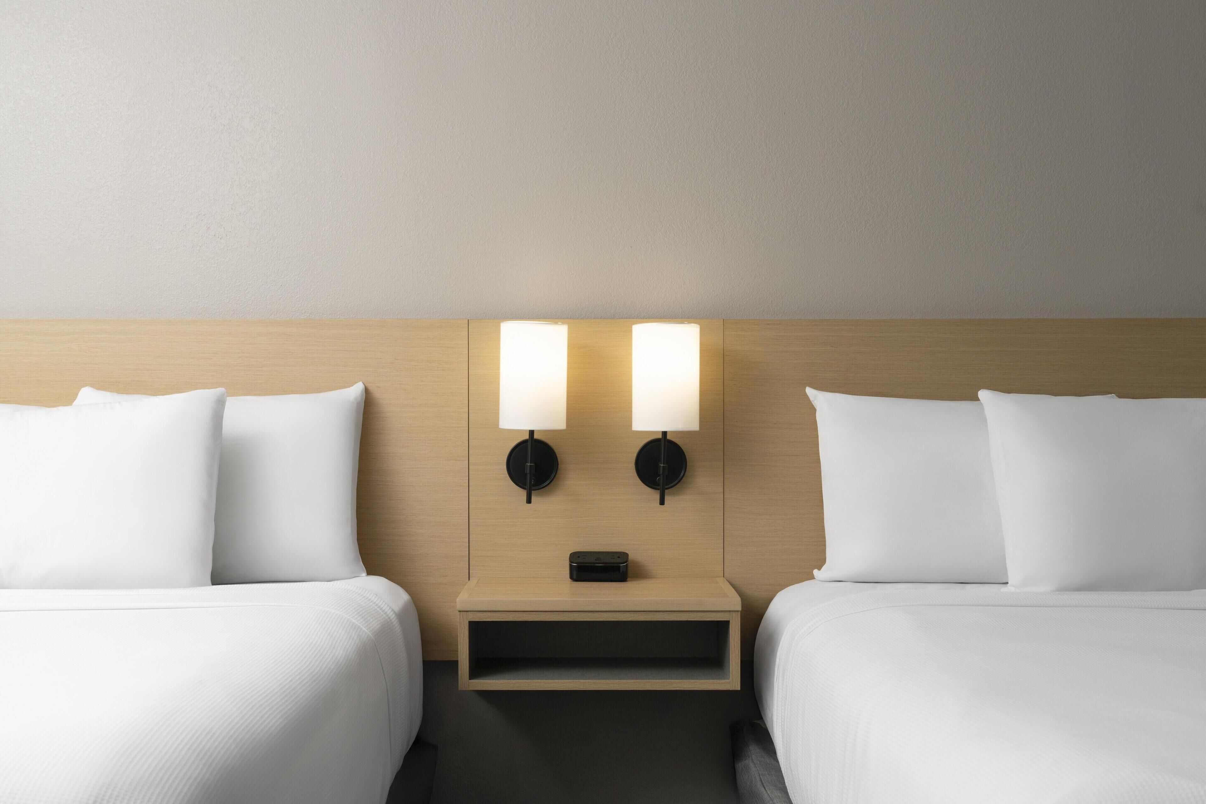 Down comforters, desk, laptop workspace, blackout drapes