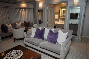 Suite, 1 King Bed, Non Smoking | Desk, iron/ironing board, free cots/infant beds, rollaway beds