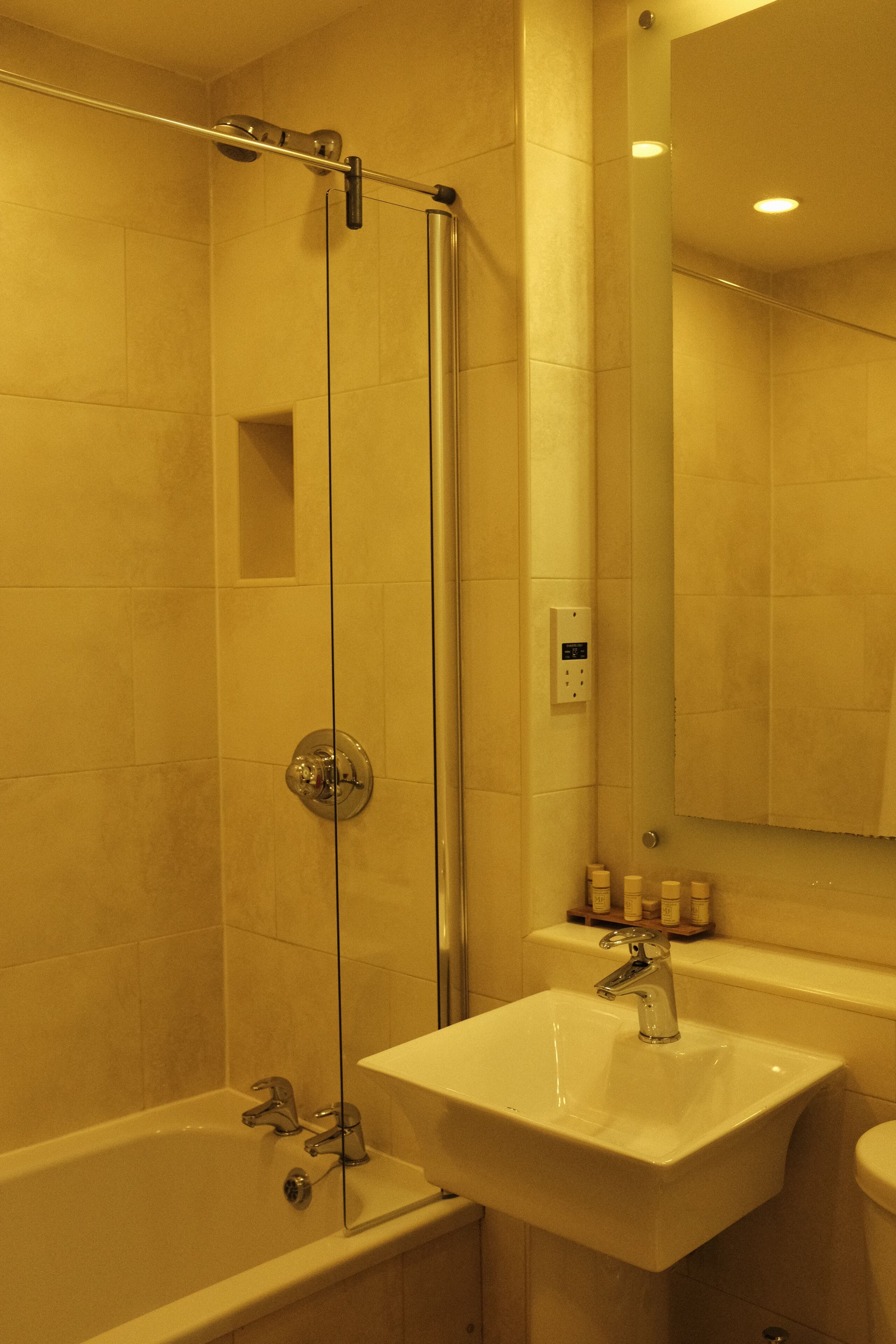 combined shower/bathtub, free toiletries, hair dryer, towels