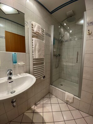 Shower, free toiletries, hair dryer, towels