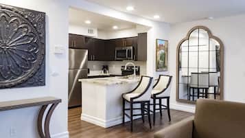 Fridge, oven, coffee/tea maker, cookware/dishes/utensils