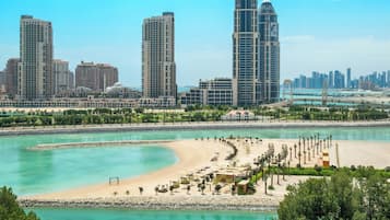 Private beach, free beach shuttle, free beach cabanas, sun-loungers