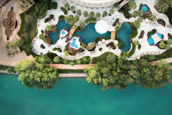 Indoor pool, outdoor pool, open 7:00 AM to 10:00 PM, pool umbrellas
