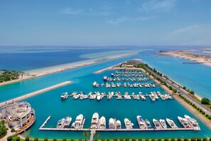 Stunning marina views surround this waterfront property, offering access to a scenic promenade and the sea.