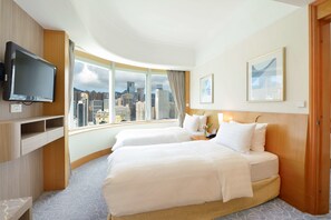 Deluxe Quadruple Room, Non Smoking | In-room safe, desk, blackout curtains, iron/ironing board