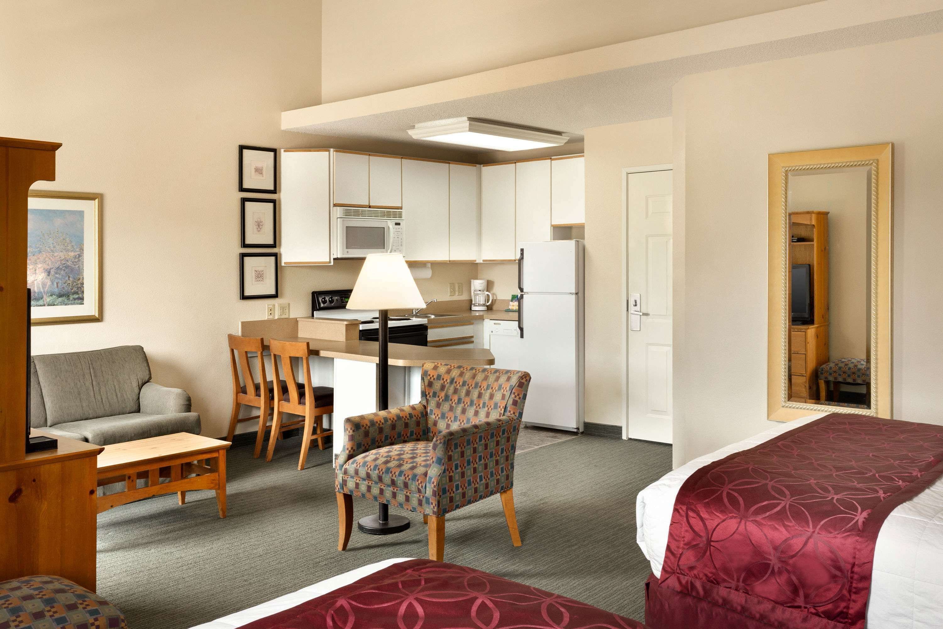 room, 2 queen beds, non smoking | in-room safe, desk, iron/ironing board, free wifi