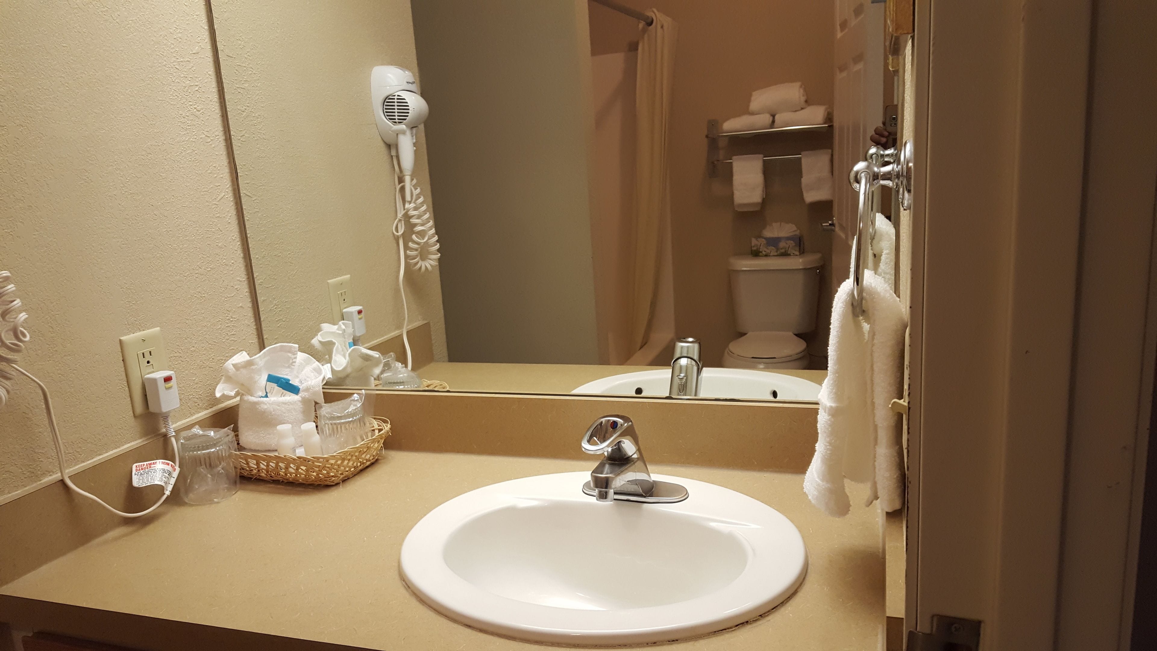 combined shower/bathtub, free toiletries, hair dryer, towels