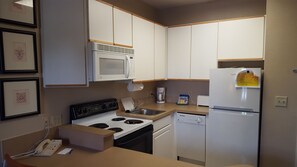Fridge, microwave, cookware/dishes/utensils