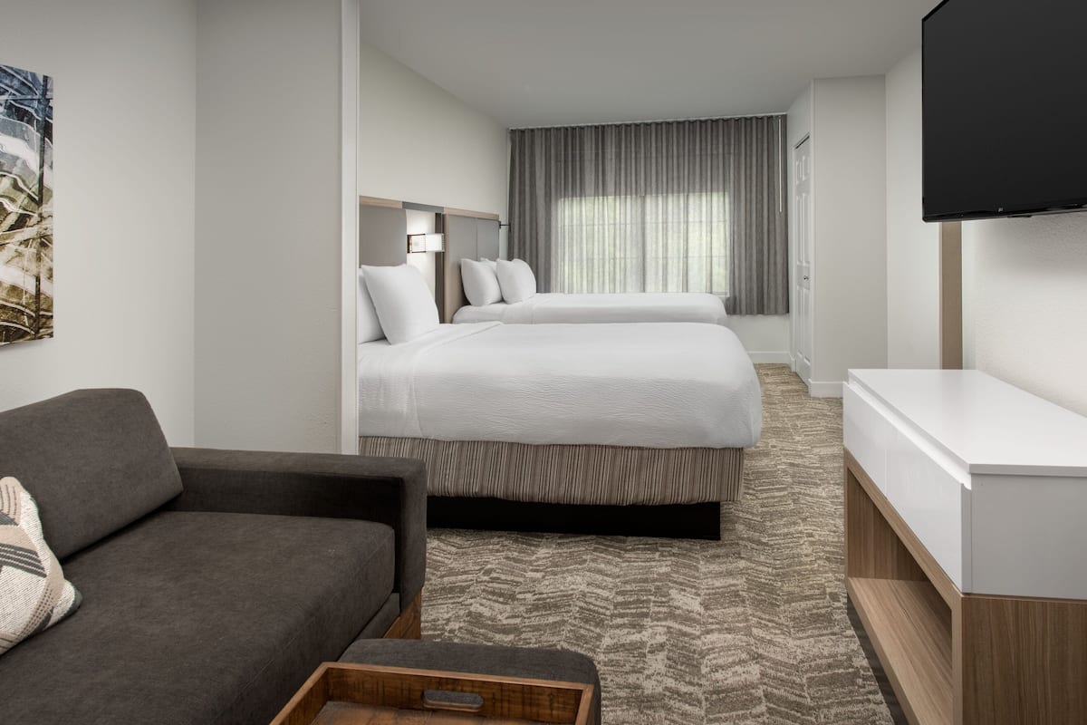 Premium bedding, down duvets, in-room safe, desk