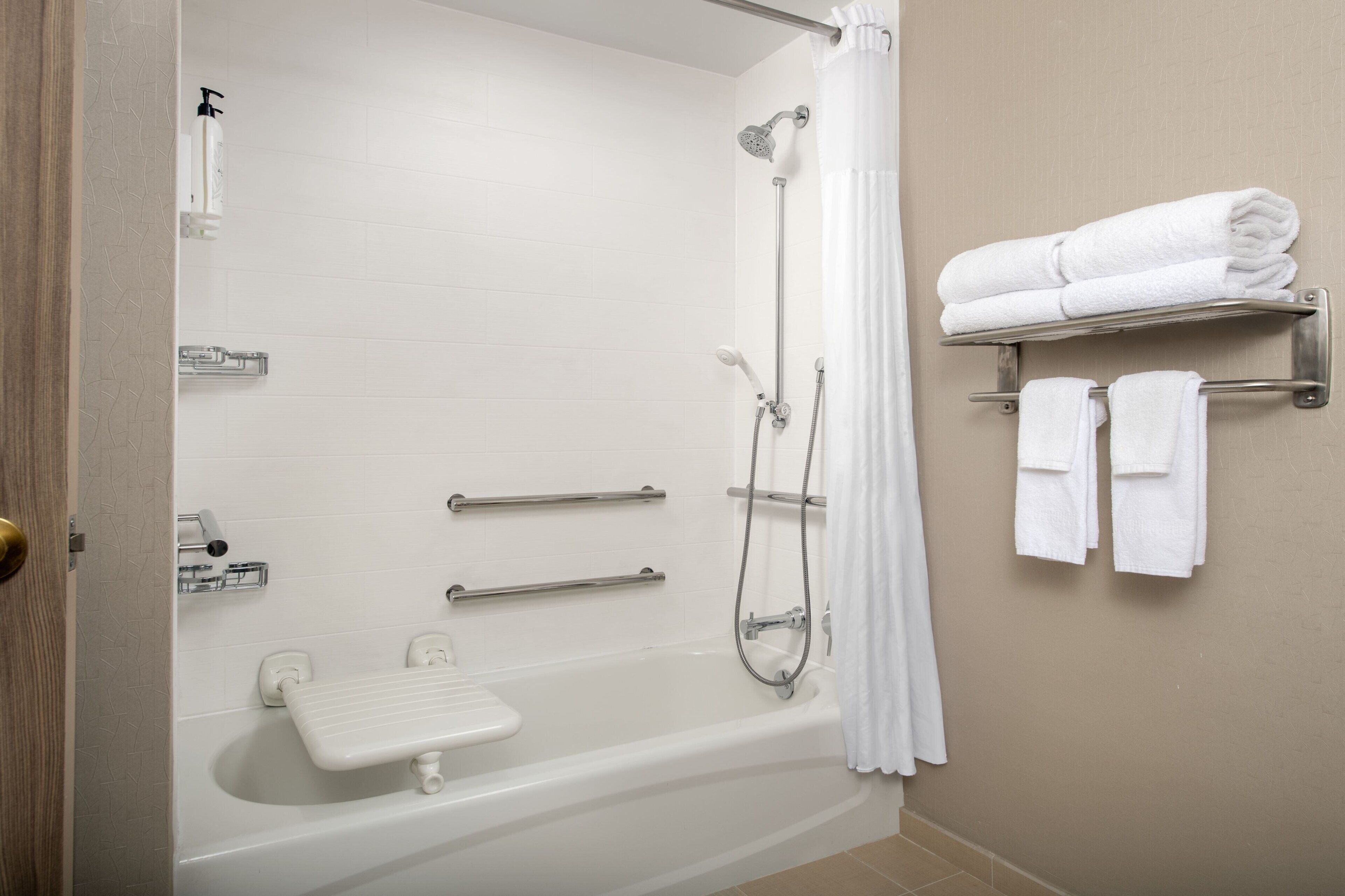 combined shower/bathtub, free toiletries, hair dryer, towels