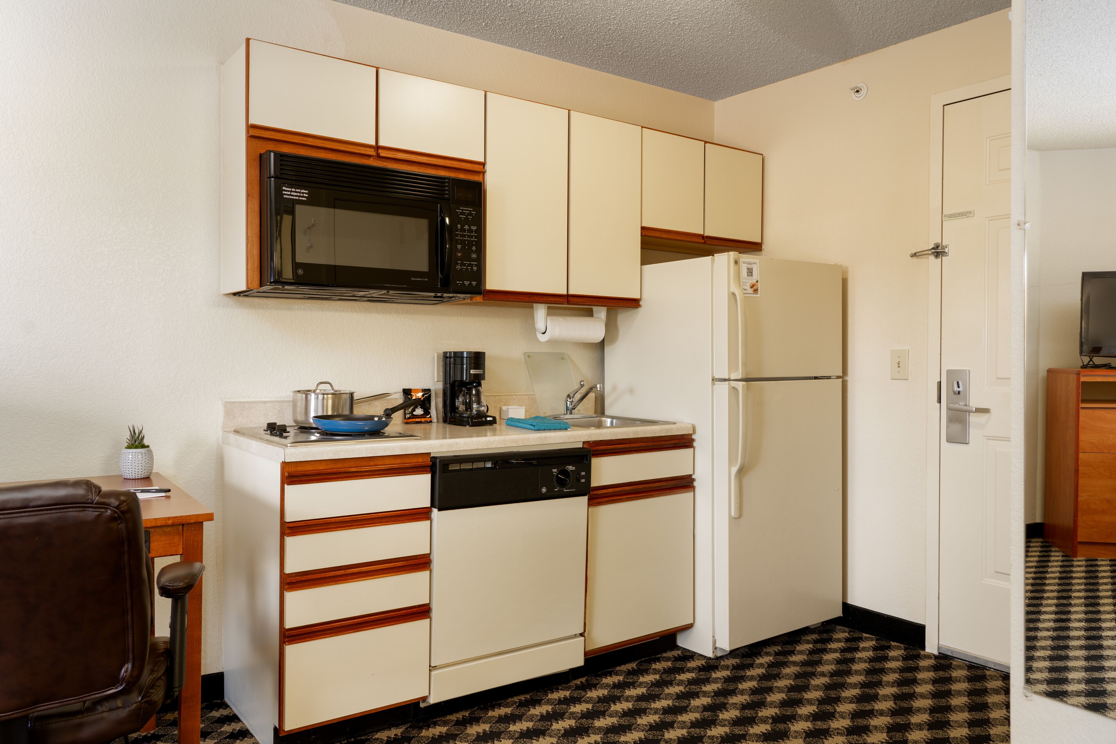 pillow-top beds, desk, blackout curtains, iron/ironing board