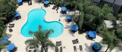 Outdoor pool, open 7:00 AM to 10:00 PM, pool umbrellas, pool loungers