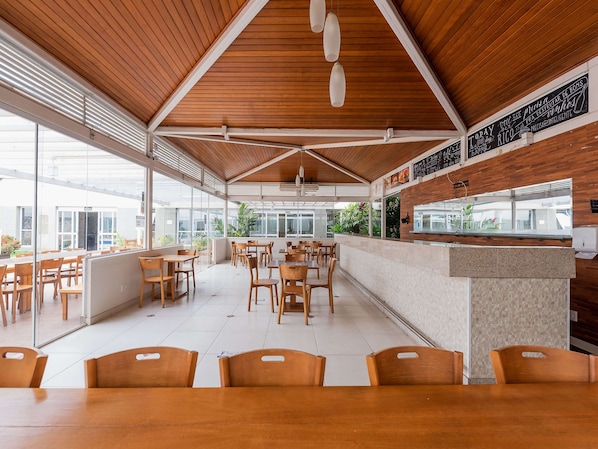 Breakfast, lunch, dinner served; pool views