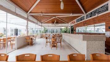 Breakfast, lunch, dinner served; pool views