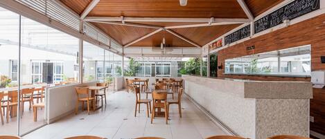 Breakfast, lunch, dinner served; pool views