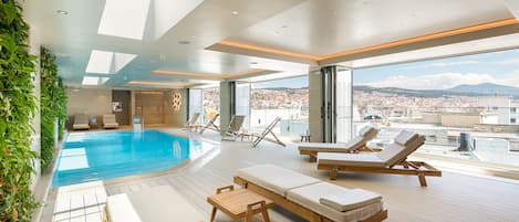 Indoor pool, sun loungers