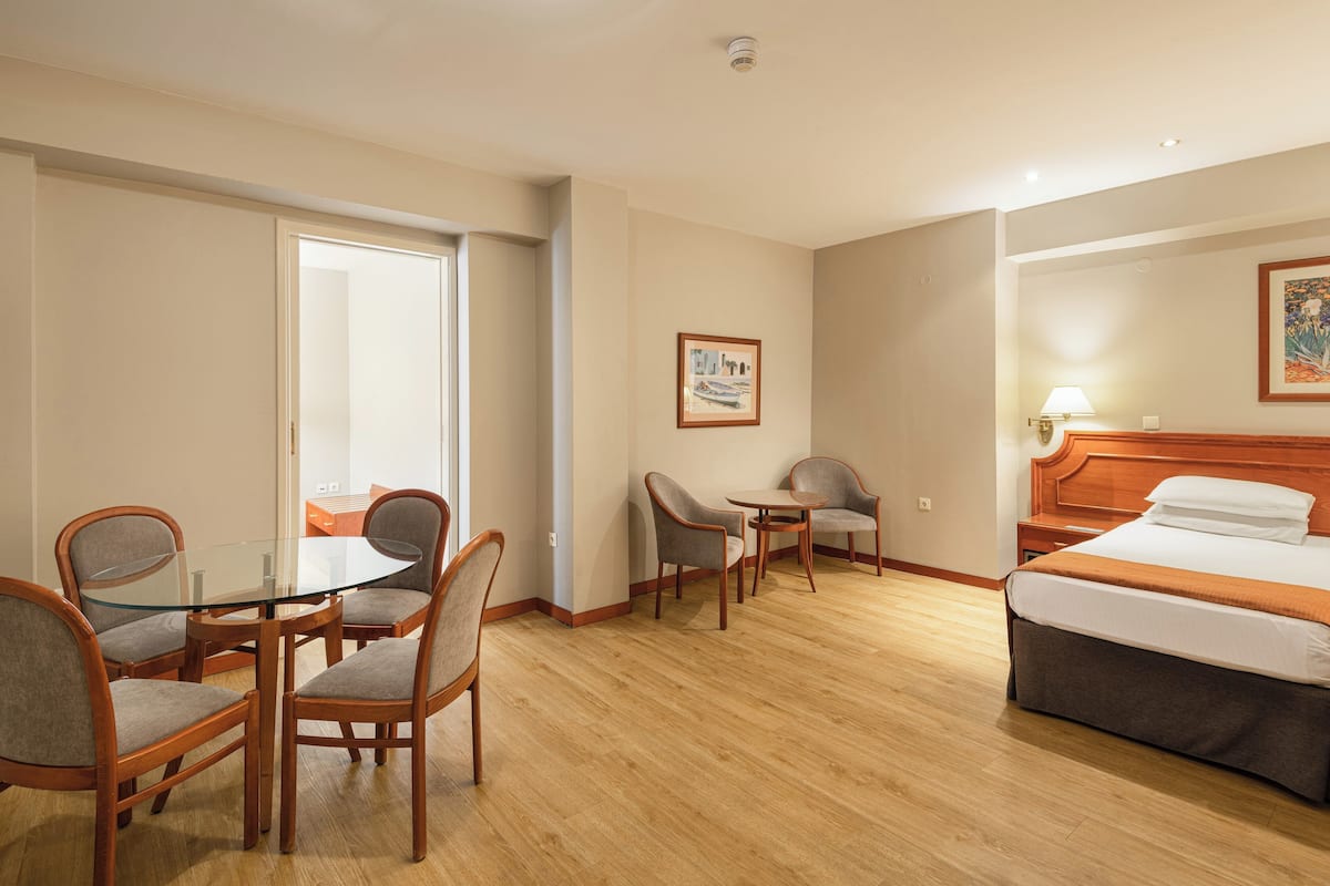Suite, 2 Bedrooms (2 Single Beds) | Minibar, in-room safe, desk, laptop workspace