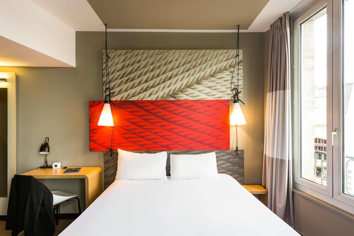 Premium bedding, pillow-top beds, desk, laptop workspace