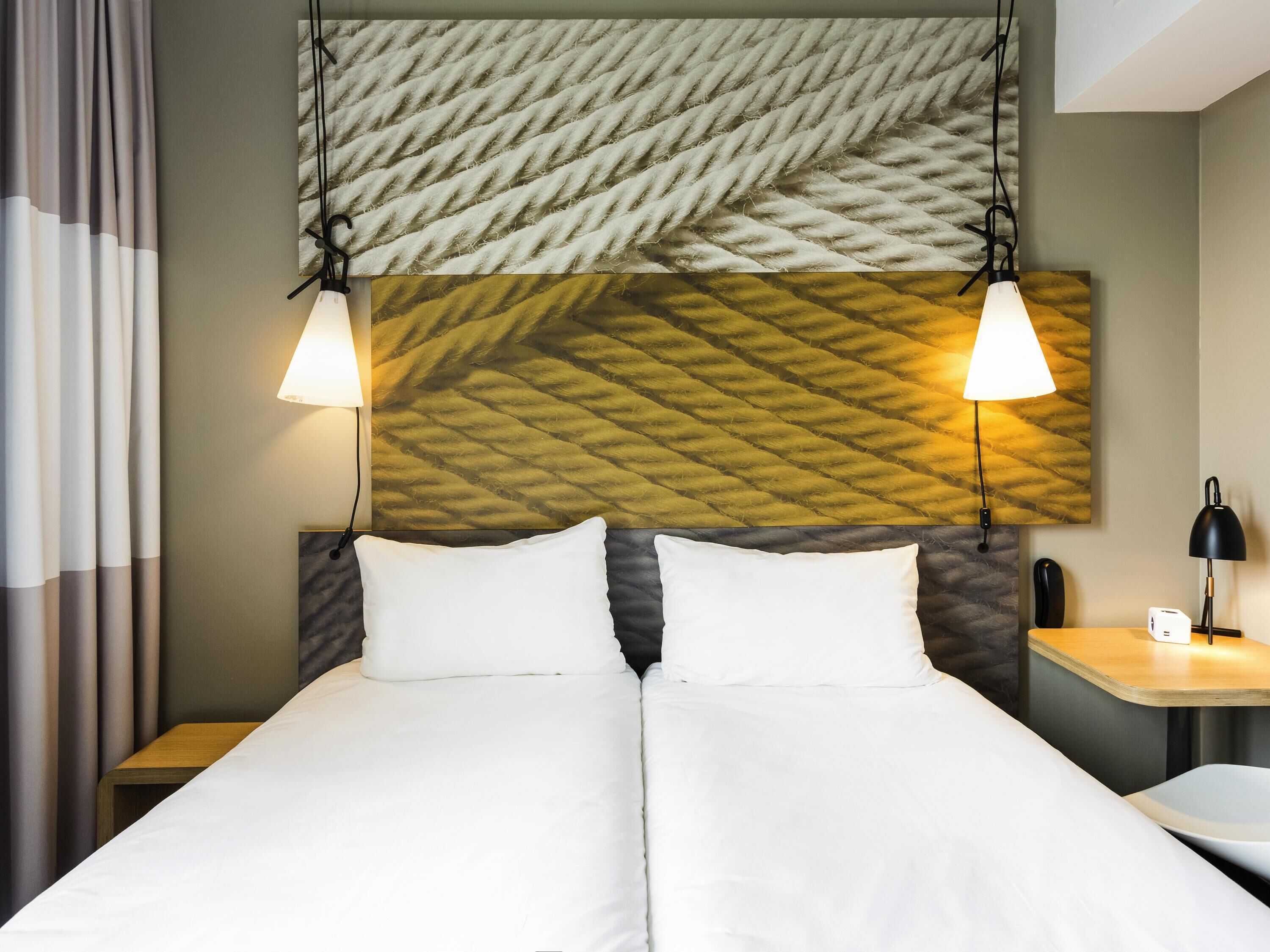 Premium bedding, pillowtop beds, desk, laptop workspace