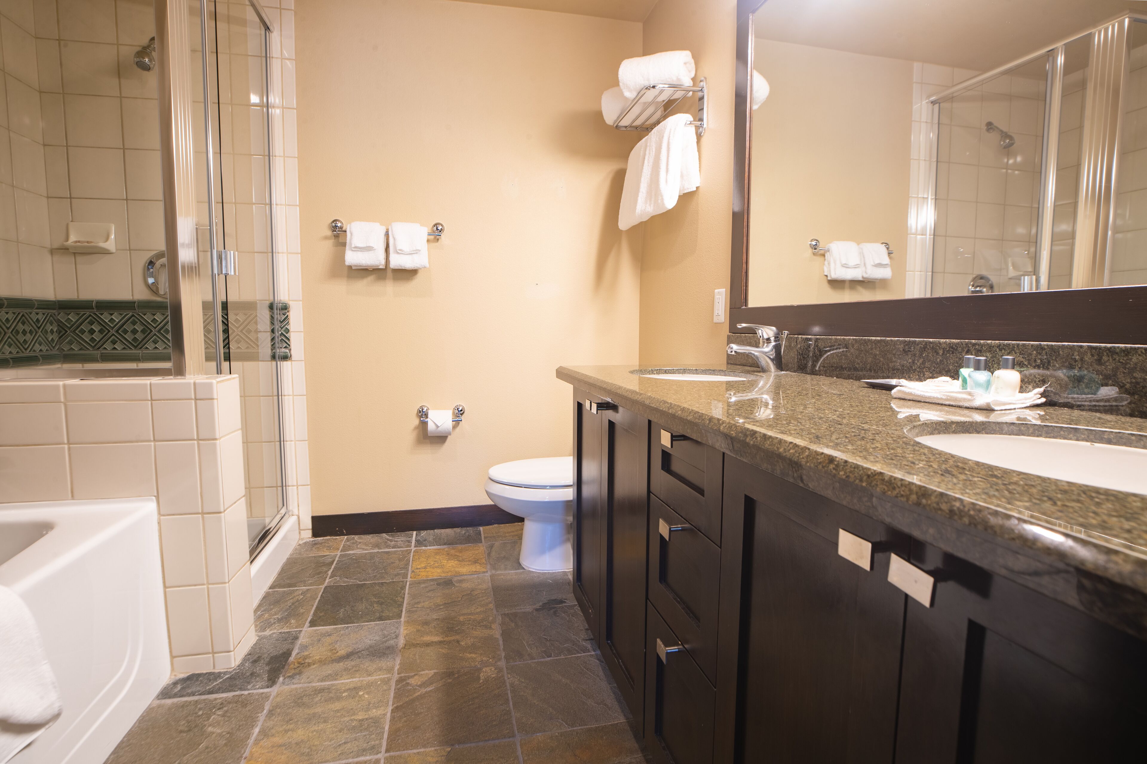 eco-friendly toiletries, hair dryer, towels