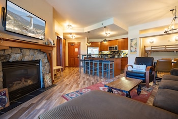 Premier Condo, One Bedroom with Den | Living area | TV, DVD player at The Village at Palisades Tahoe