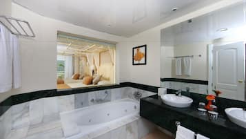 Separate tub and shower, jetted tub, free toiletries, hair dryer