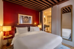 Premium bedding, down comforters, minibar, in-room safe