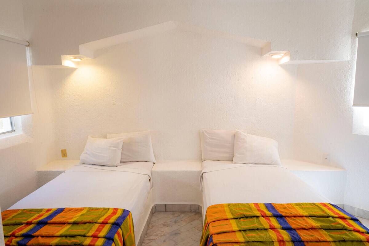 In-room safe, iron/ironing board (on request), bed sheets