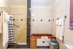 Deluxe Suite, 1 King Bed with Sofa bed, Ocean View (Cliffside) | Bathroom | Free toiletries, hair dryer, towels - Sebastian's on the Beach (West End)