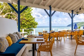 Breakfast, lunch, dinner served; Caribbean cuisine, beach views  - Sebastian's on the Beach (West End)