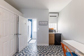 Room, 1 King Bed, Balcony, Beachfront | 1 bedroom, in-room safe, individually decorated, individually furnished