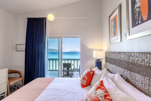 Room, 1 King Bed, Balcony, Beachfront | 1 bedroom, in-room safe, individually decorated, individually furnished