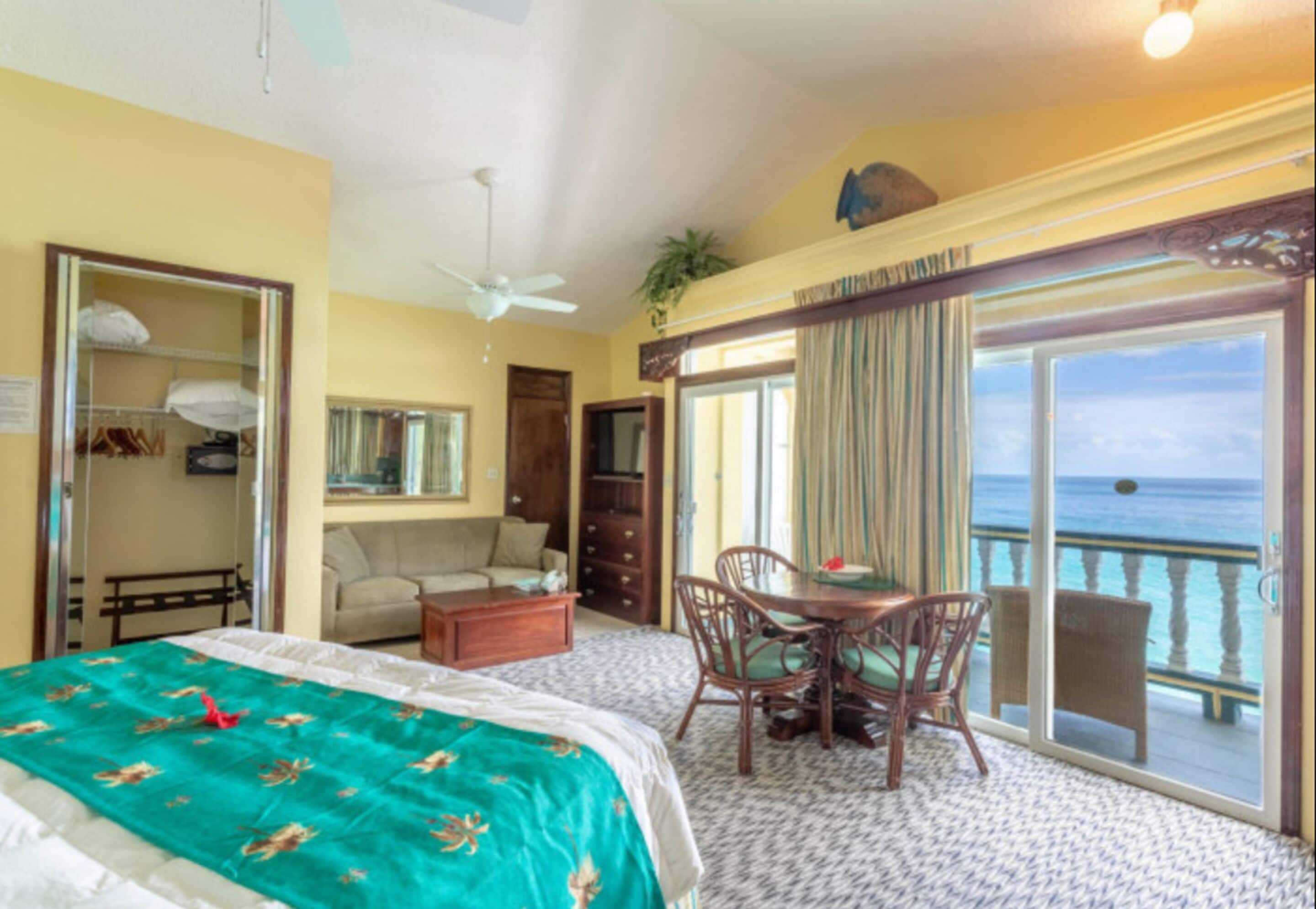 deluxe suite, 1 king bed with sofa bed, ocean view (cliffside) | in-room safe, individually decorated, individually furnished, desk
