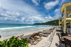 Relax on the beach with ocean views from our elevated rooms and lounge on the shore with comfortable seating.