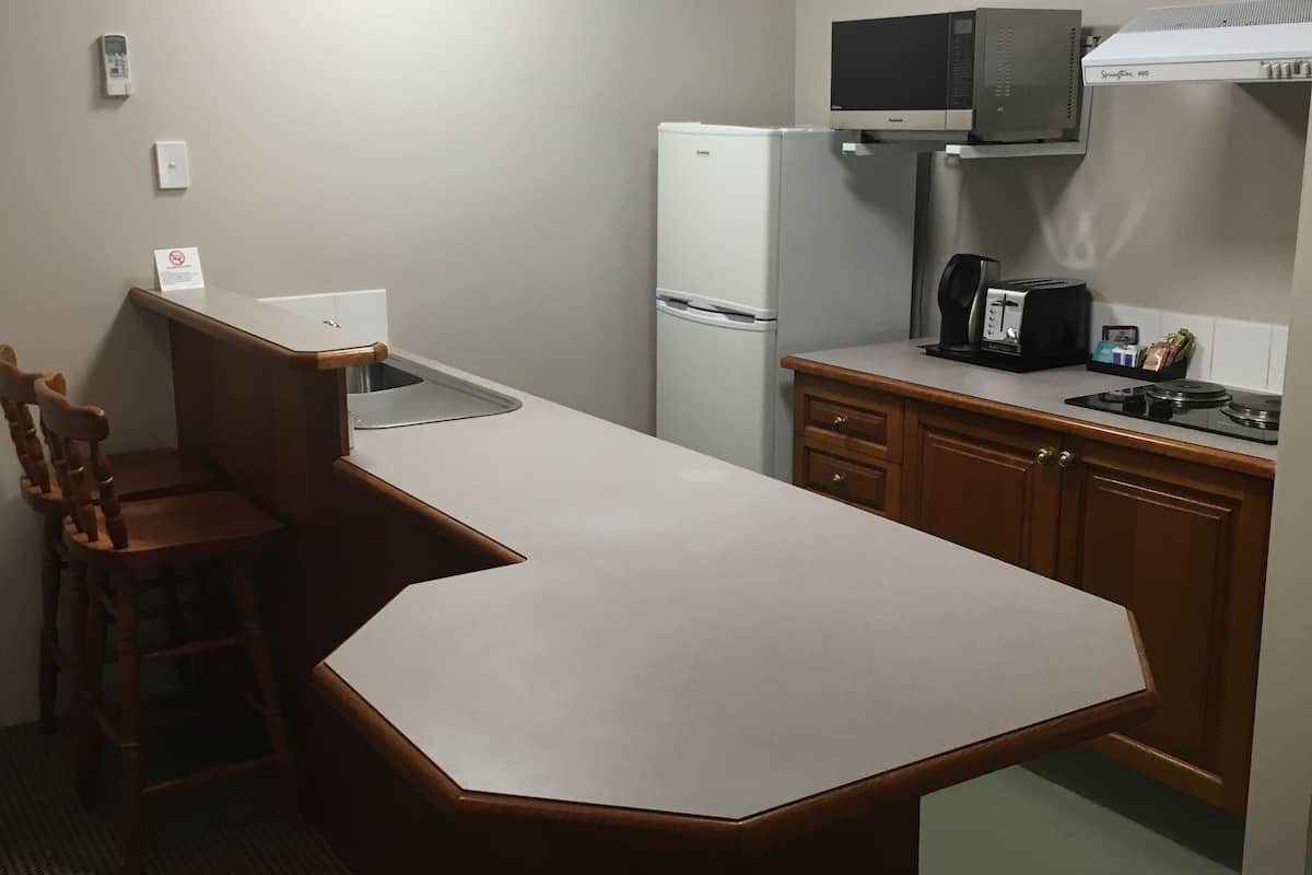 fridge, coffee/tea maker, electric kettle, toaster