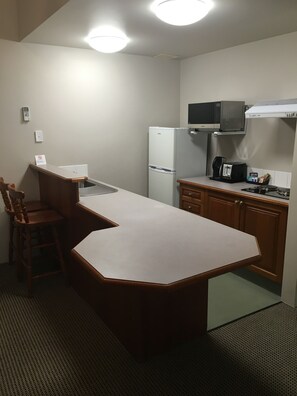 Fridge, coffee/tea maker, electric kettle, toaster