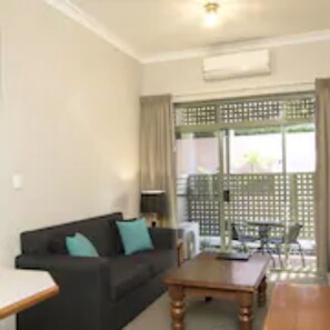 One Bedroom Apartment | Living area | LCD TV, DVD player
