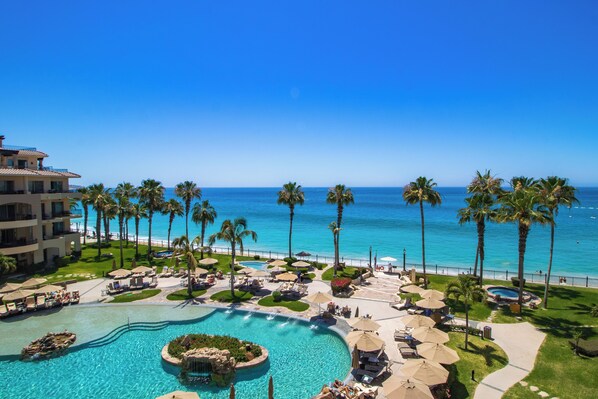 2 outdoor pools, pool umbrellas, sun loungers