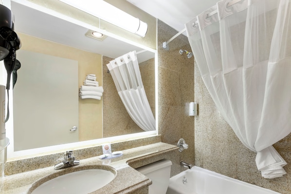 Suite, 1 King Bed, Non Smoking | Bathroom | Free toiletries, hair dryer, towels
