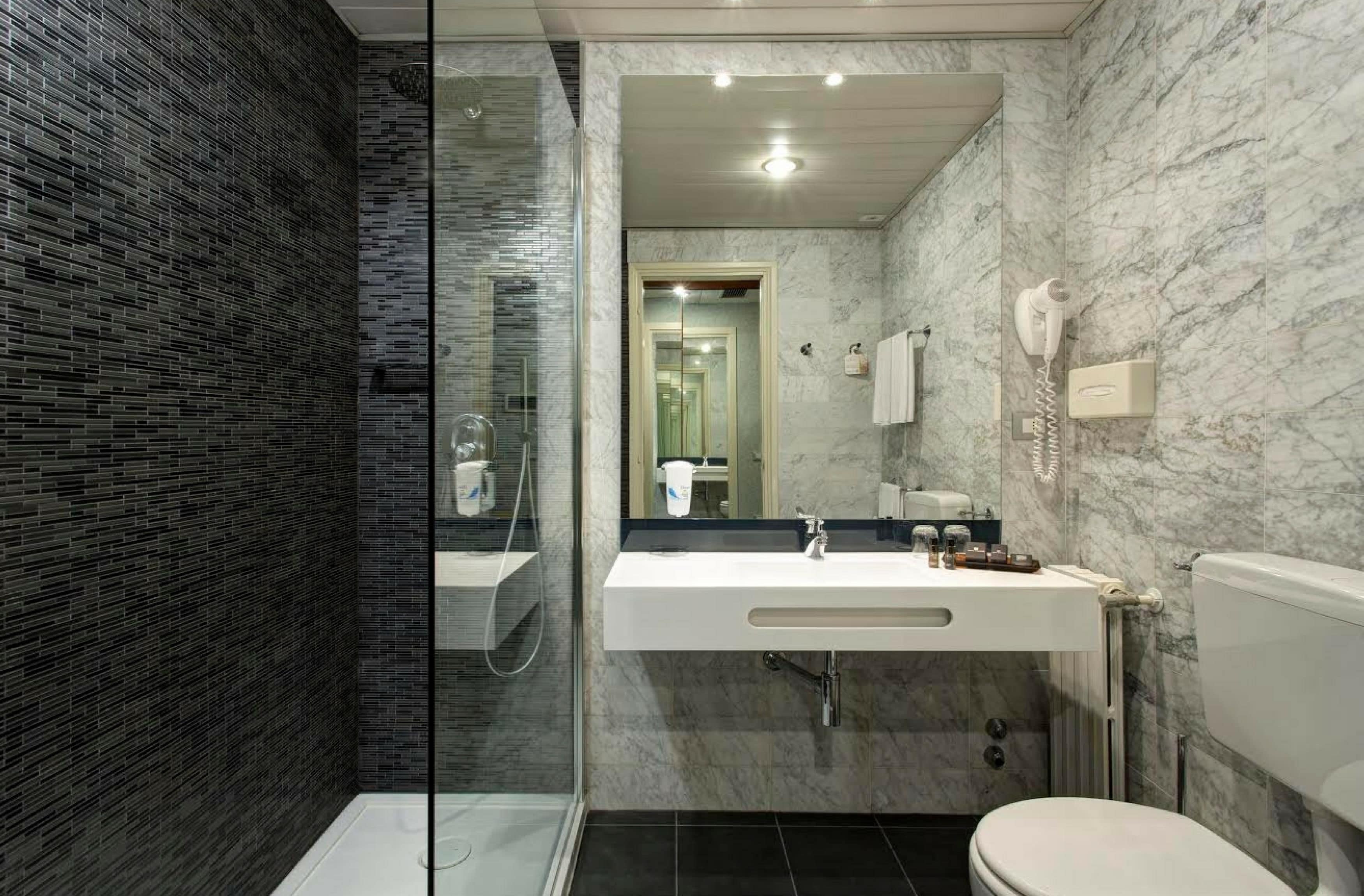 combined shower/bathtub, deep-soaking bathtub, rainfall showerhead