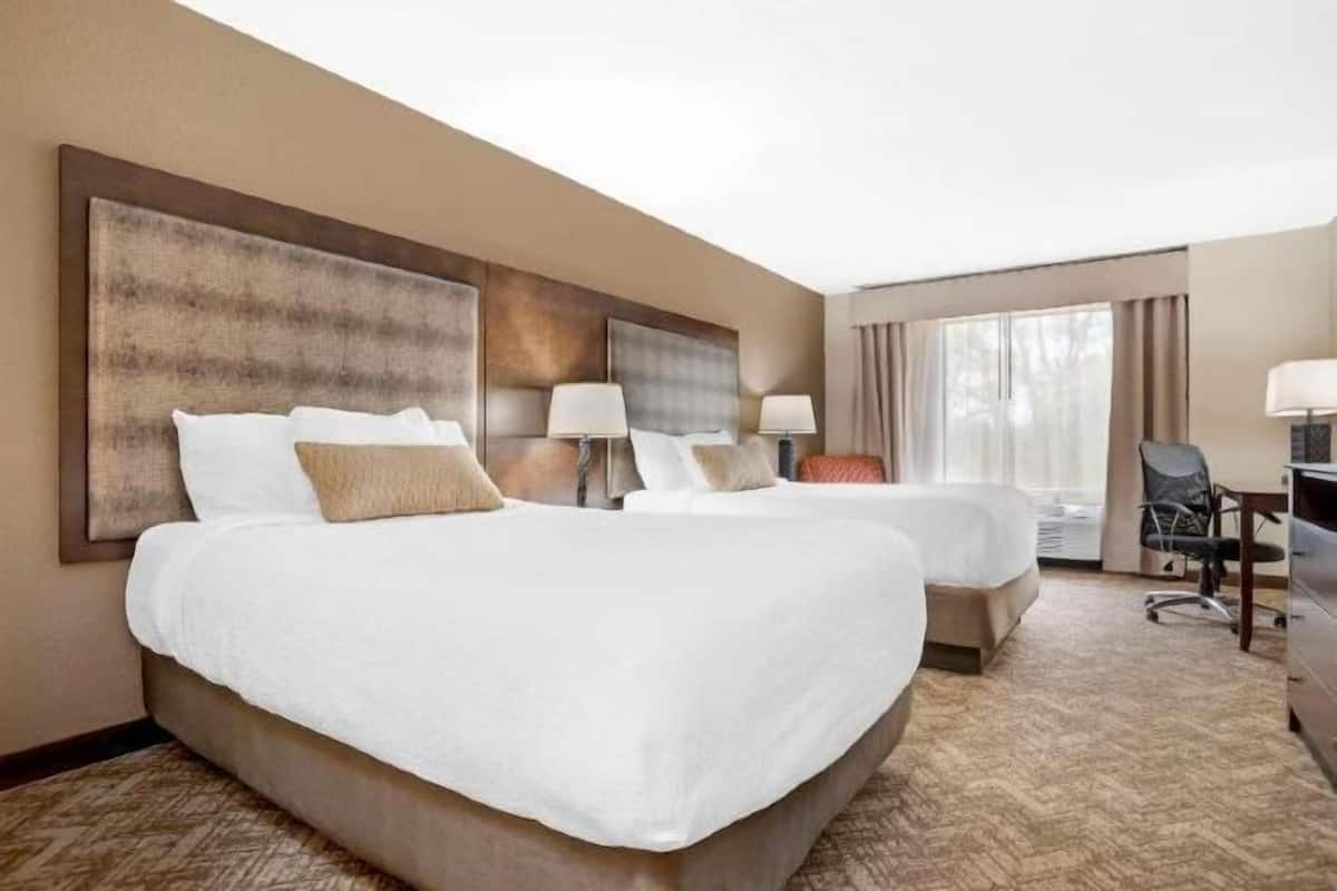 Down comforters, pillowtop beds, in-room safe, desk