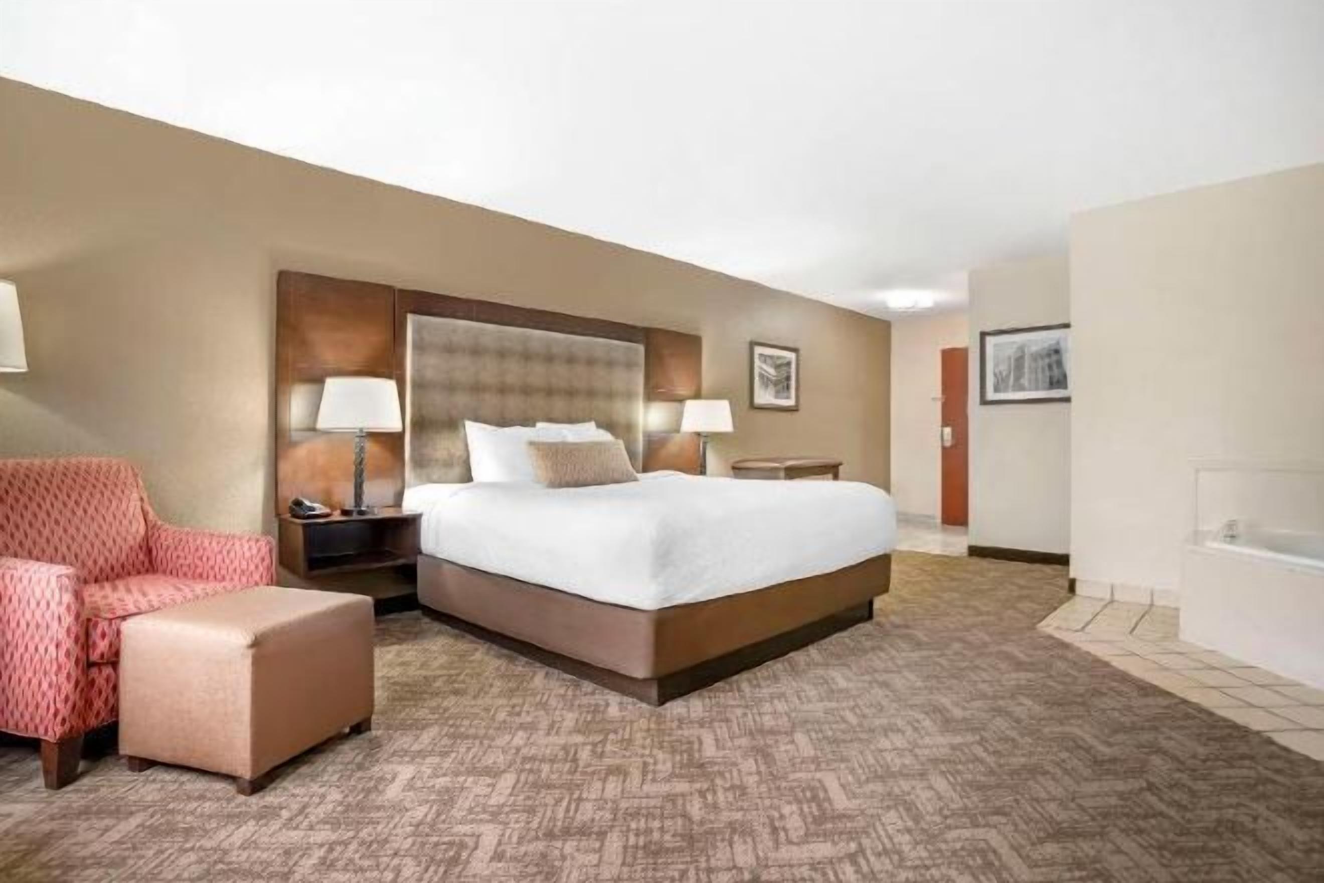 Down duvets, pillow-top beds, in-room safe, desk