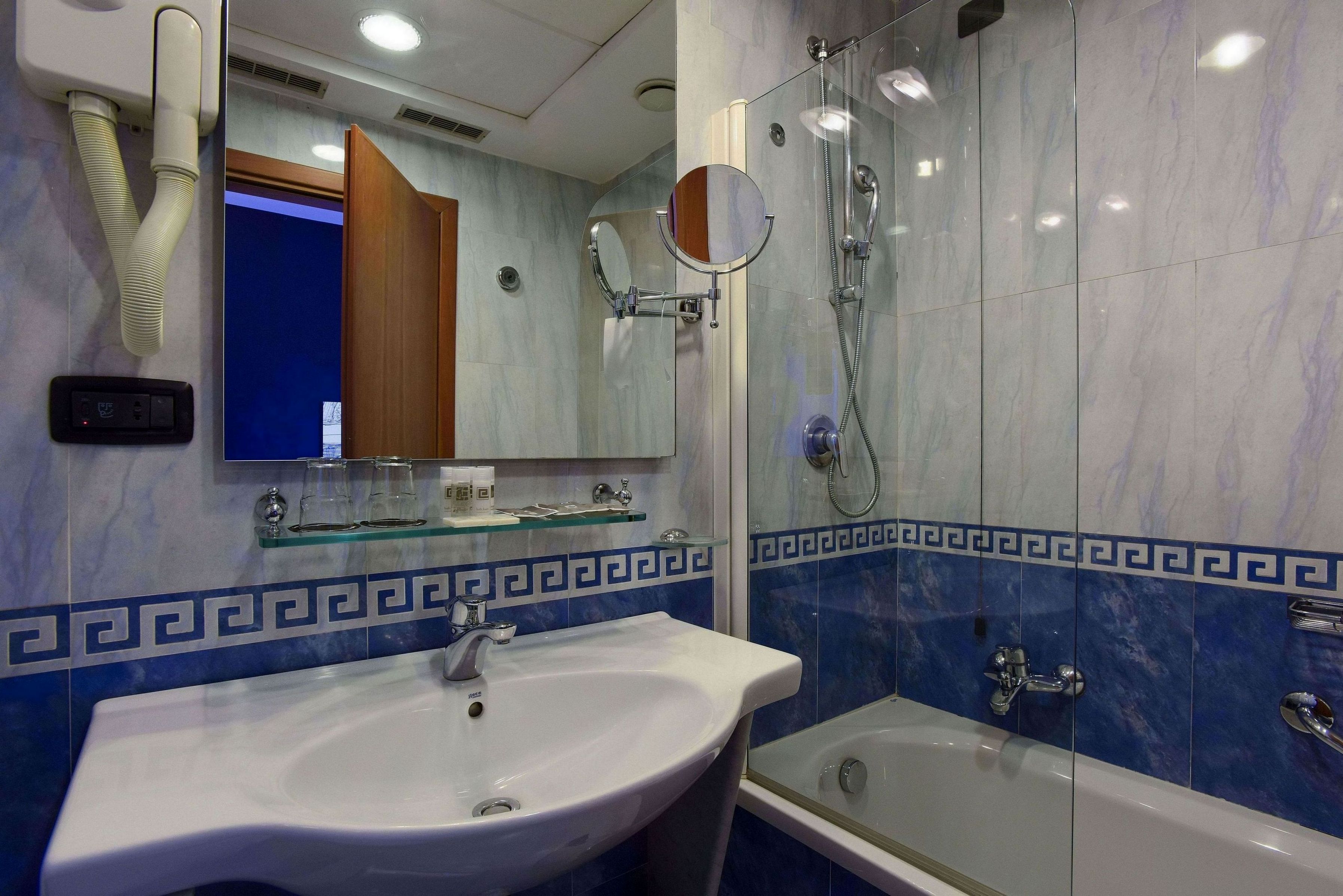 deluxe room, terrace, tower | down duvets, in-room safe, desk, laptop workspace